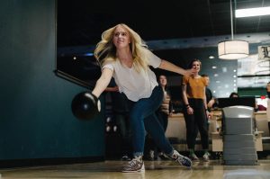 Photo of woman bowling at Wayward Social in Marshalltown, Iowa